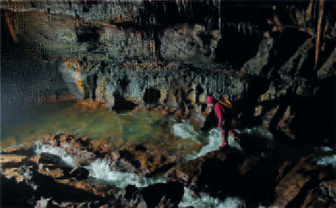 Circulation en écoulement libre (dans un conduit partiellement rempli d'eau).

Photo prise dans la grotte d'En Versenne (source : Guy Decreuse)
Site du photographe : https://www.flickr.com/photos/73270743@N02/